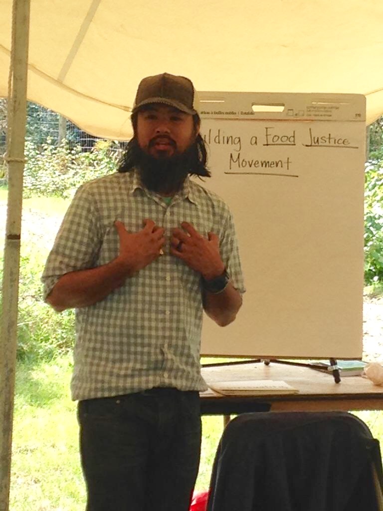 Shane Bernardo at D-Town Farm's Annual Harvest Festival facilitating a "Building a Food Justice Movement" workshop